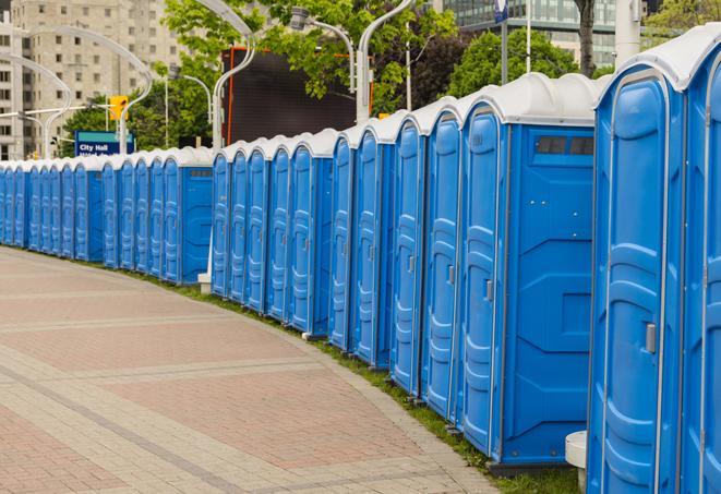 a row of portable restrooms at a fairground, offering visitors a clean and hassle-free experience in irvington