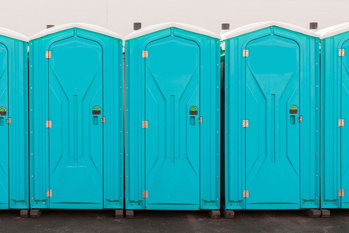 Industrial portable restroom units at a plant in Newark, New Jersey